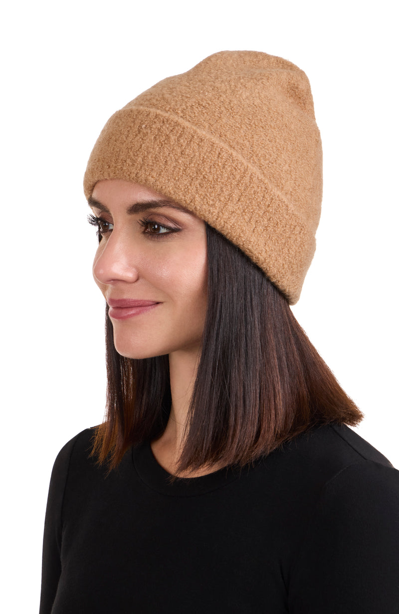 CASHMERE BOUCLE CUFFED BEANIE in camel on model