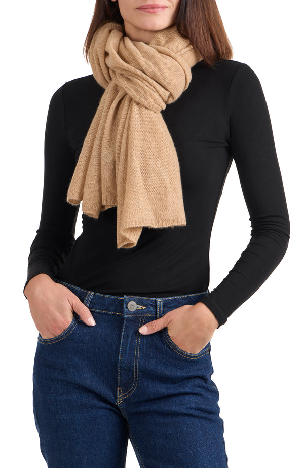model wearing CASHMERE FEATHER WEIGHT TRAVEL WRAP in  camel