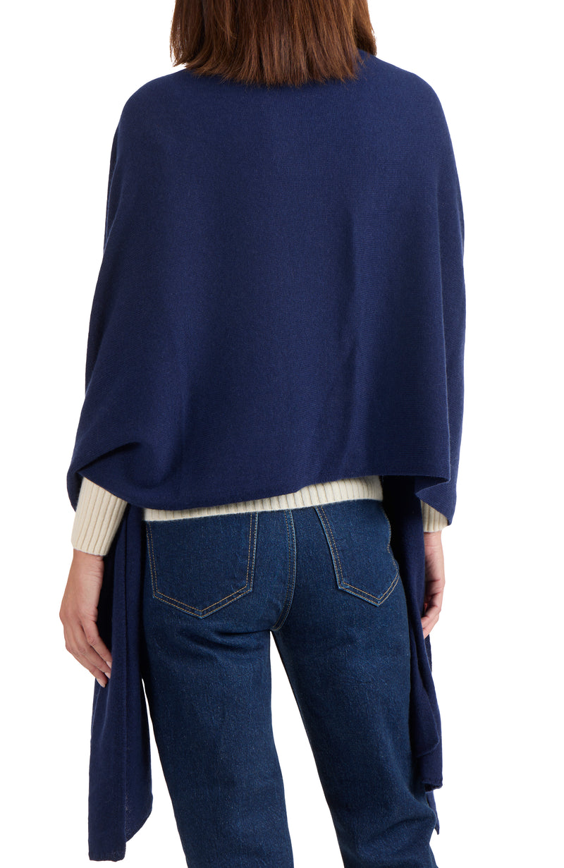 model wearing CASHMERE JERSEY TRAVEL WRAP in navy