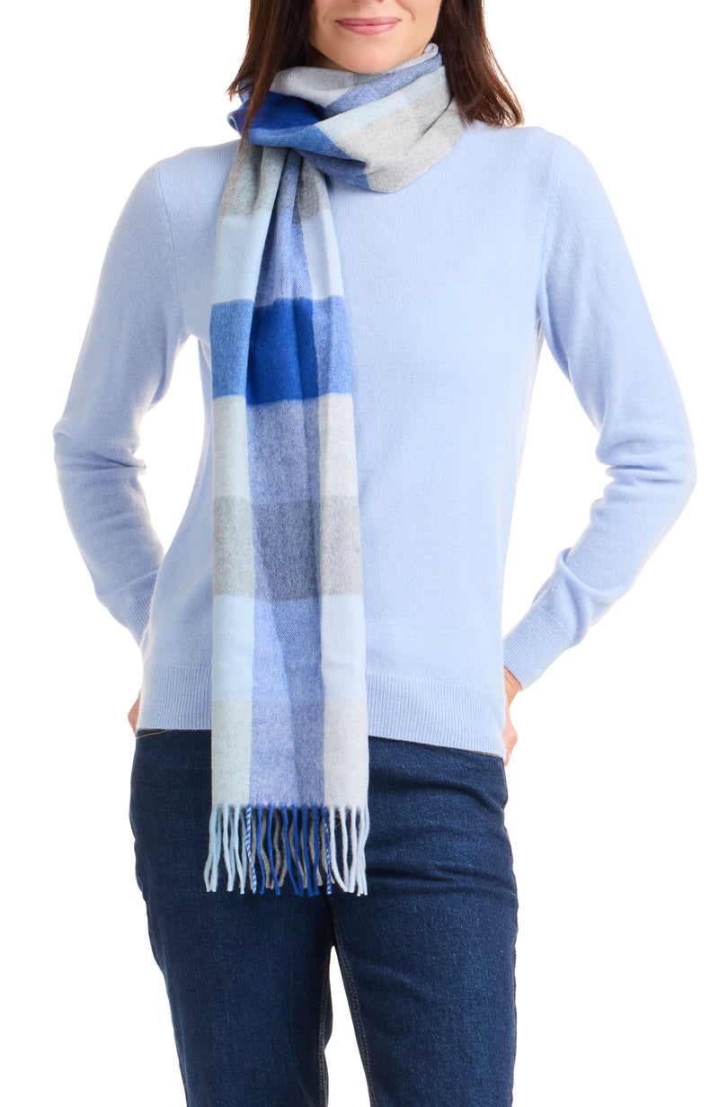 model wearing CASHMERE BUFFALO CHECK SCARF in blue multi