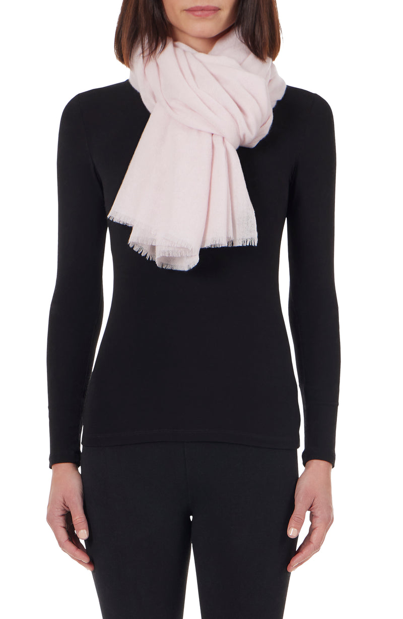 model wearing LIGHTWEIGHT CASHMERE GAUZE WRAP in light pink, tied