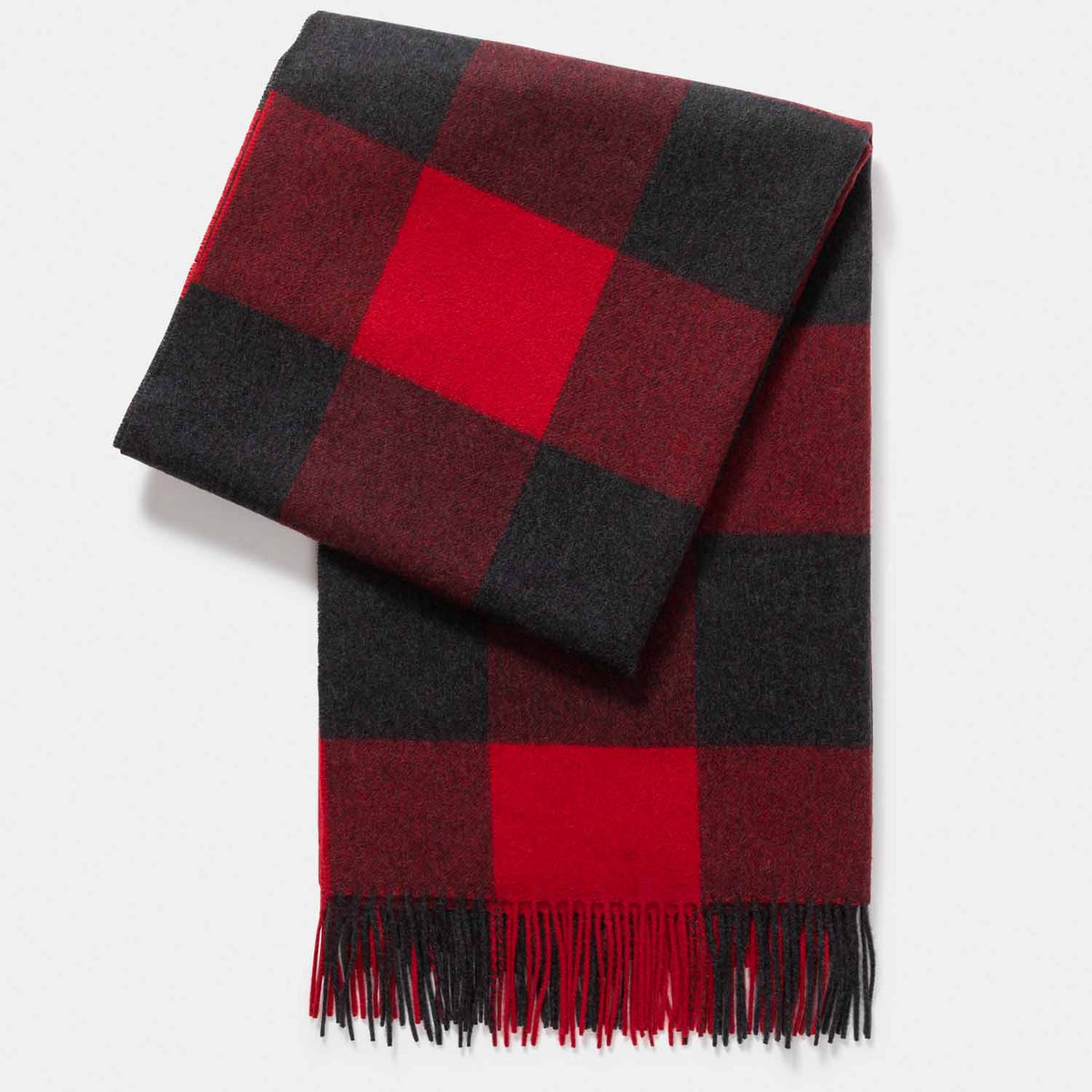 Picture of a woven cashmere throw in red and black buffalo plaid.